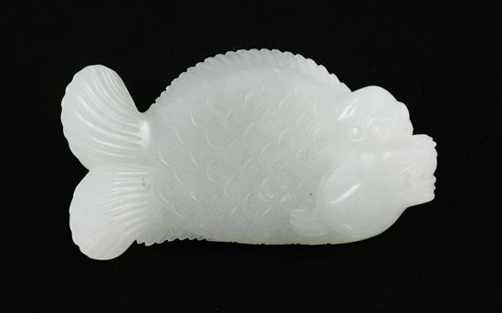 A Chinese white jade carving of dragon-fish, 8.5cm.